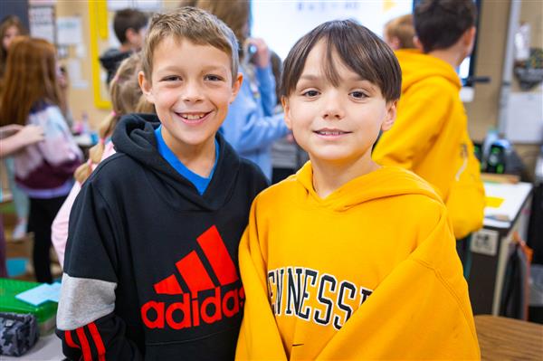 Students inside their classrooms learning. 